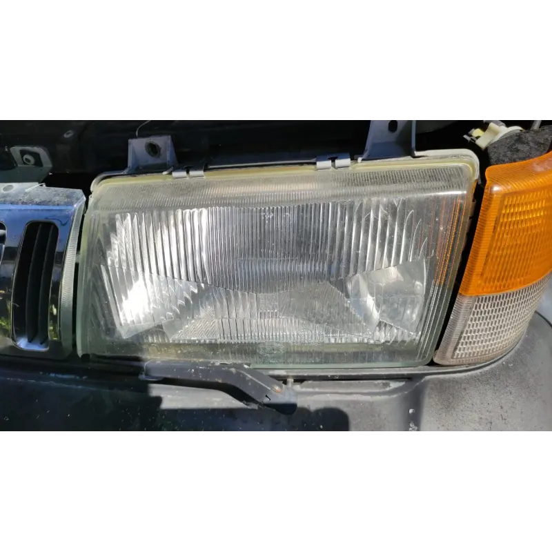 Phare gauche saab 900